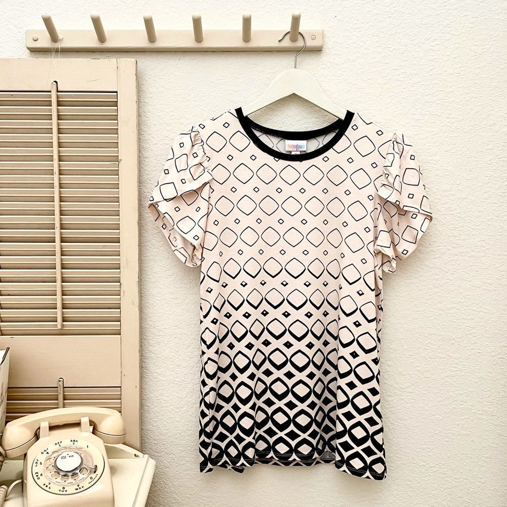 LuLaRoe “Olive” Style Tulip Sleeve Top with Geometric Print, Cream & Bla…